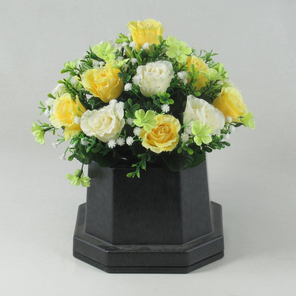 Artificial silk rose memorial crem pot with yellow/white/green blooms on dark pedestal base