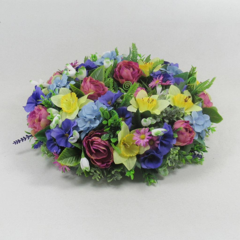 Artificial silk wreath, 15in, close view of roses and purple flowers with yellow petals