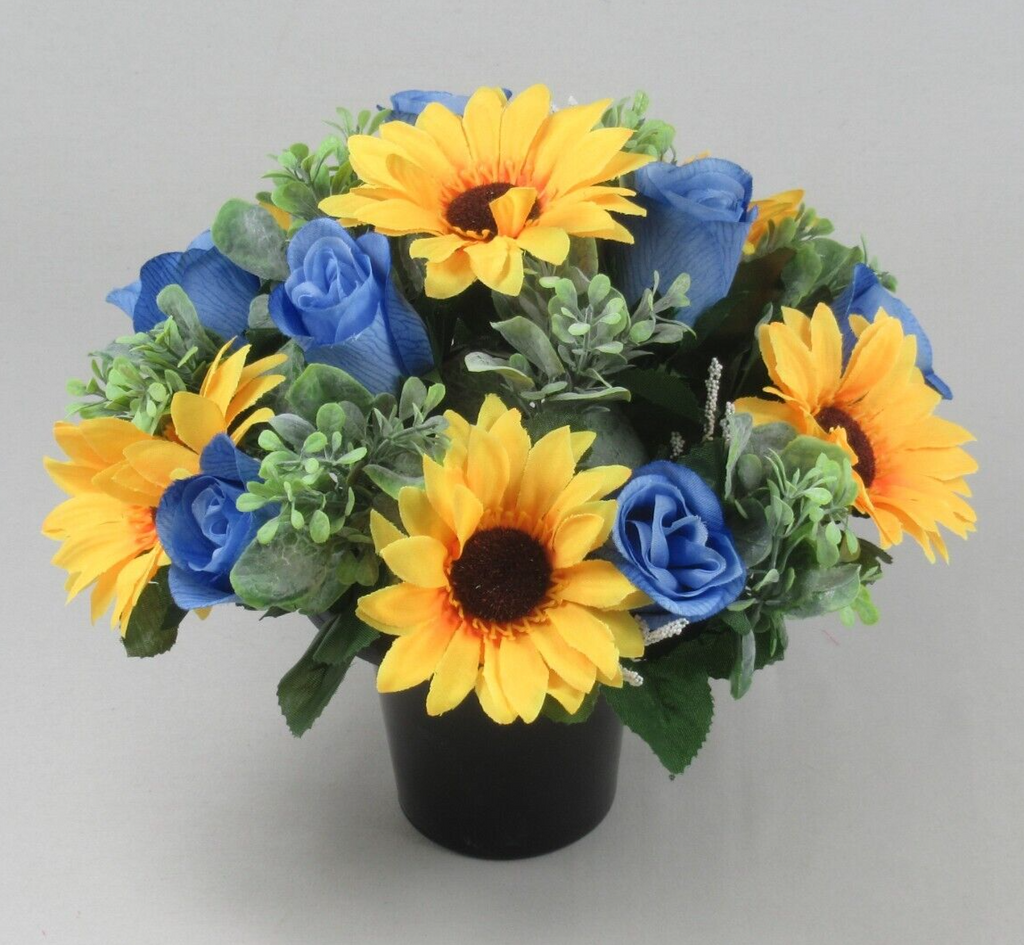 Sunflower and blue rose artificial grave arrangement in black memorial pot