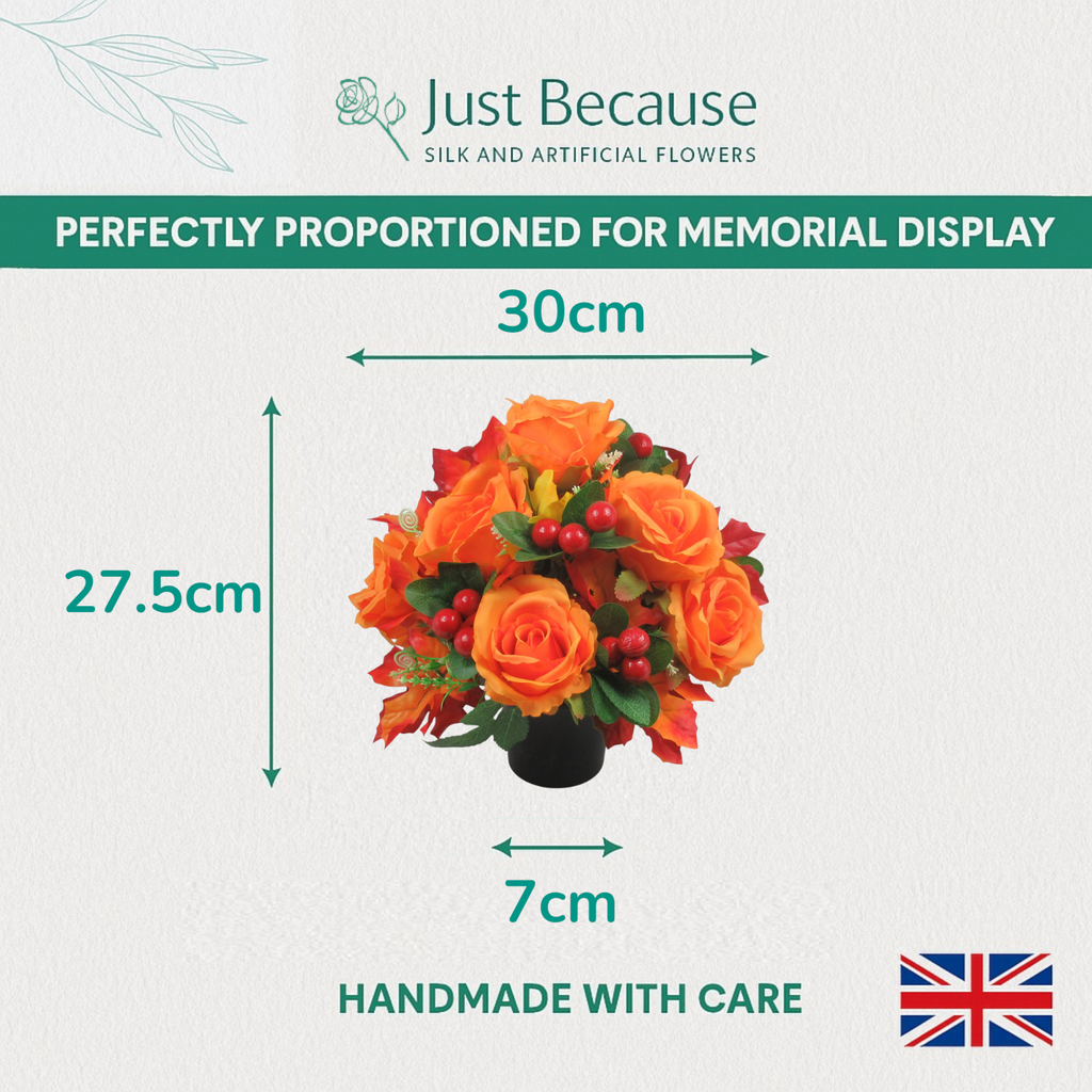 Orange rose and red berry grave arrangement, about 30cm wide, in black pot