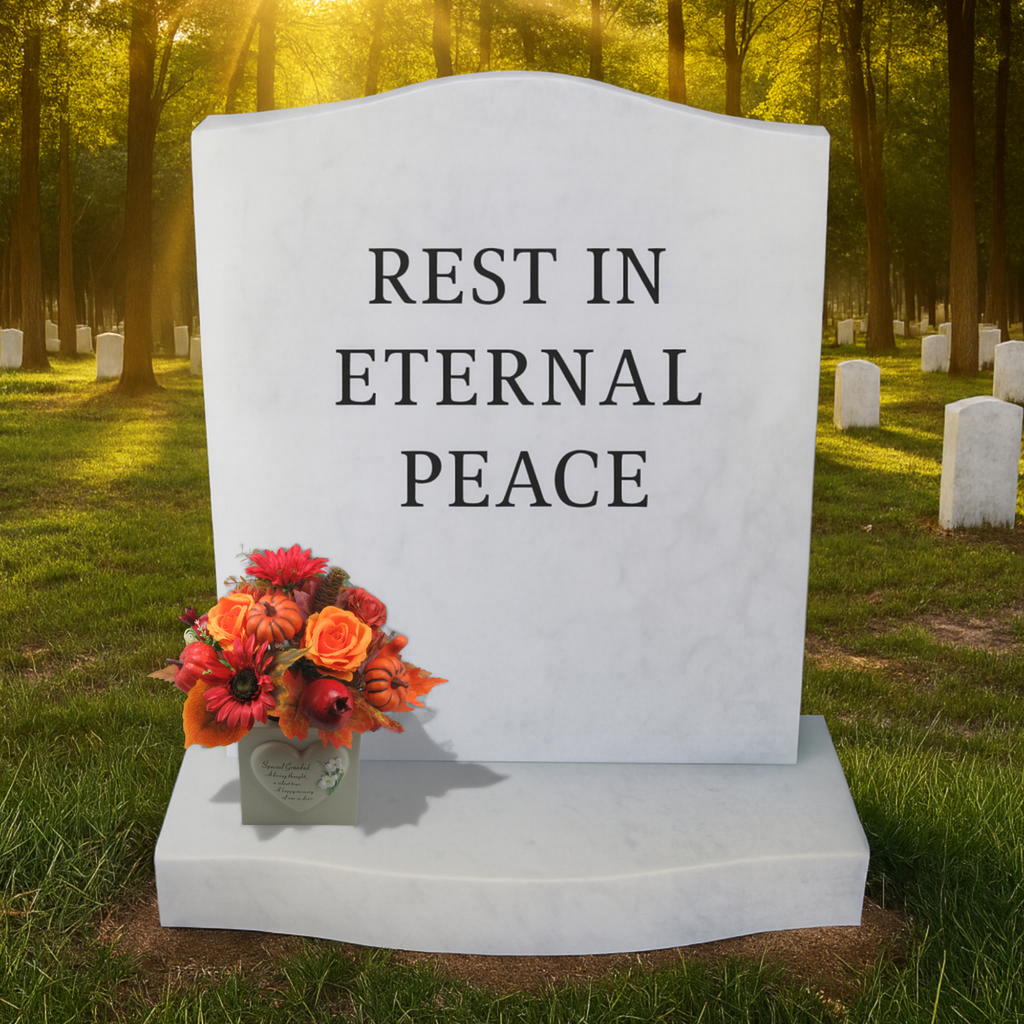 REST IN ETERNAL PEACE memorial stone with autumn artificial gravepot flowers in light-colored pot