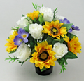 Artificial silk grave pot arrangement with yellow sunflowers, white roses, blue flowers, black pot
