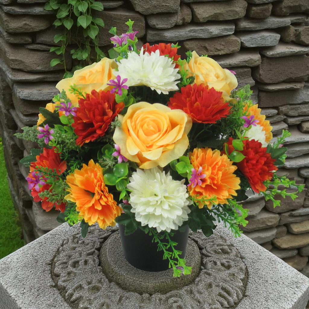 Artificial spiky chrysanthemum flower bush with orange, red, yellow, and white flowers