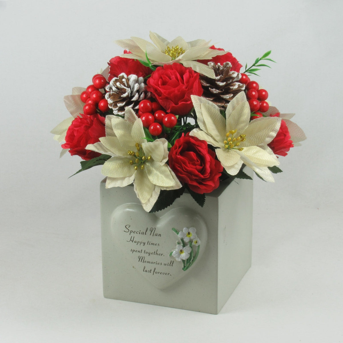 Christmas grave flower arrangement - gold poinsettias, roses, pinecones 26cm