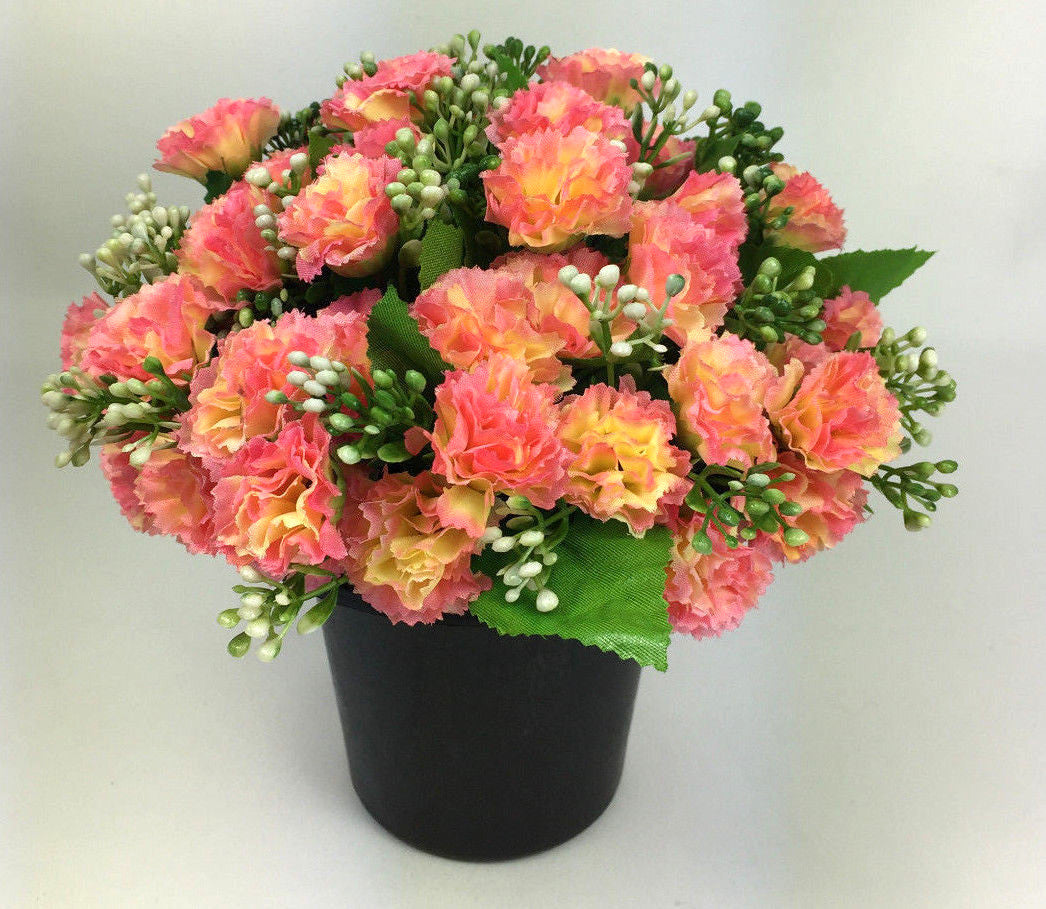 Artificial mini-carnation grave memorial pot arrangement with coral and pink carnation blooms