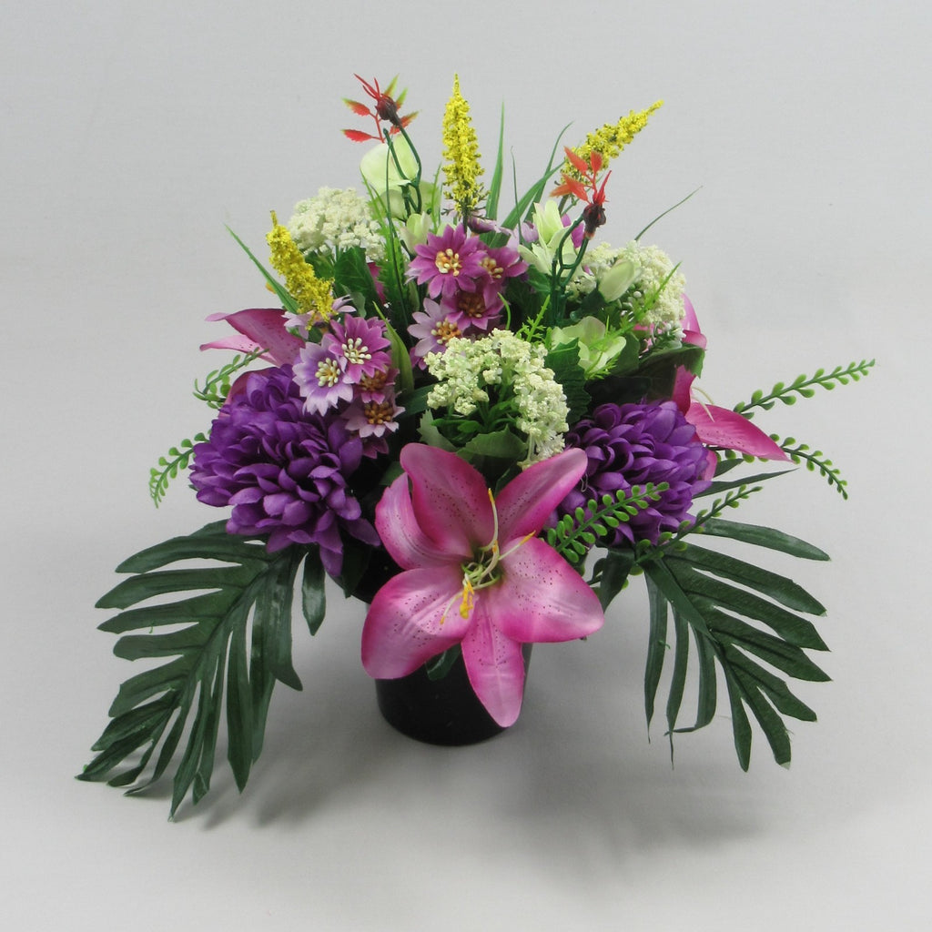 Modern style grave flower arrangement with purple chrysanthemums artificial