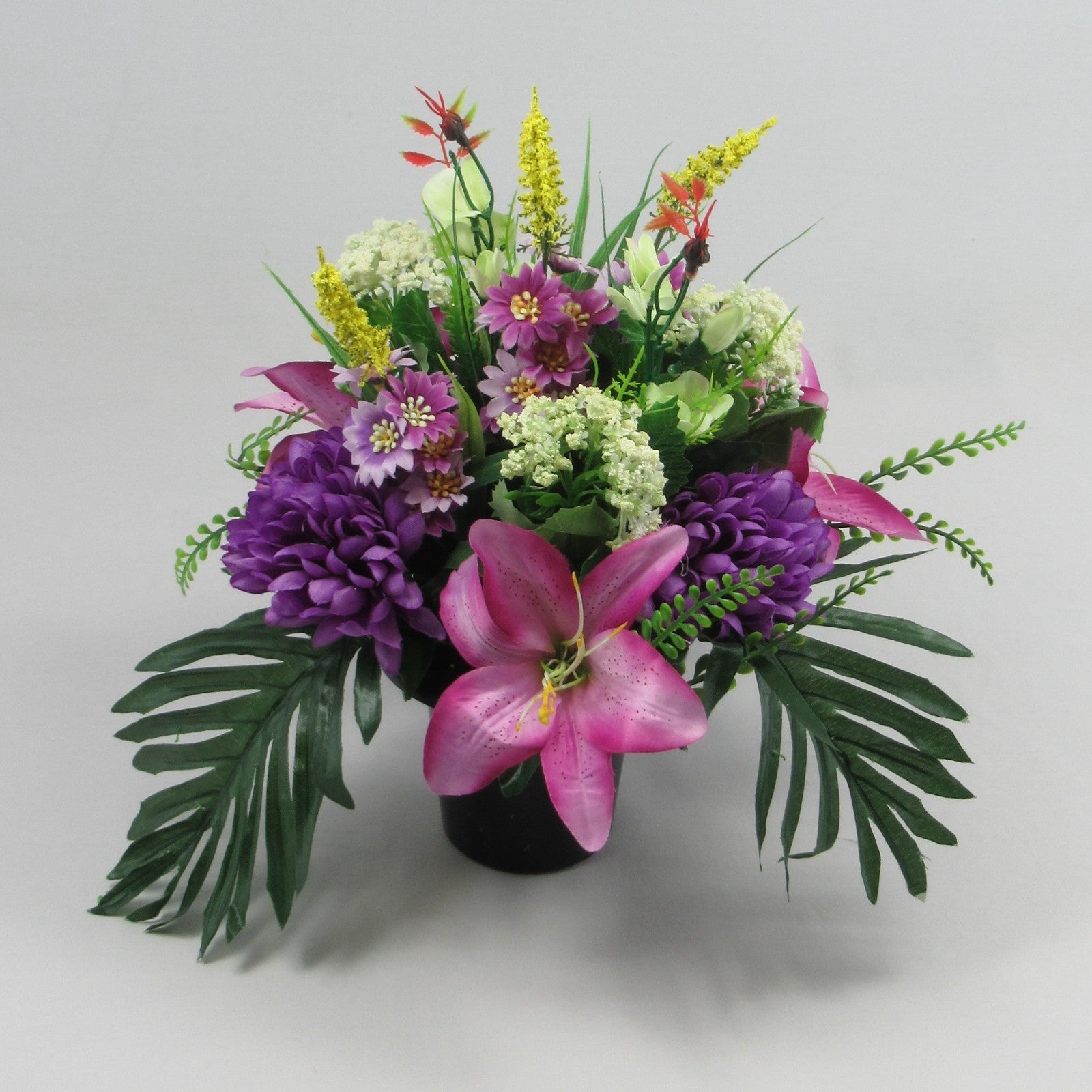 Modern style grave flower arrangement with purple chrysanthemums artificial