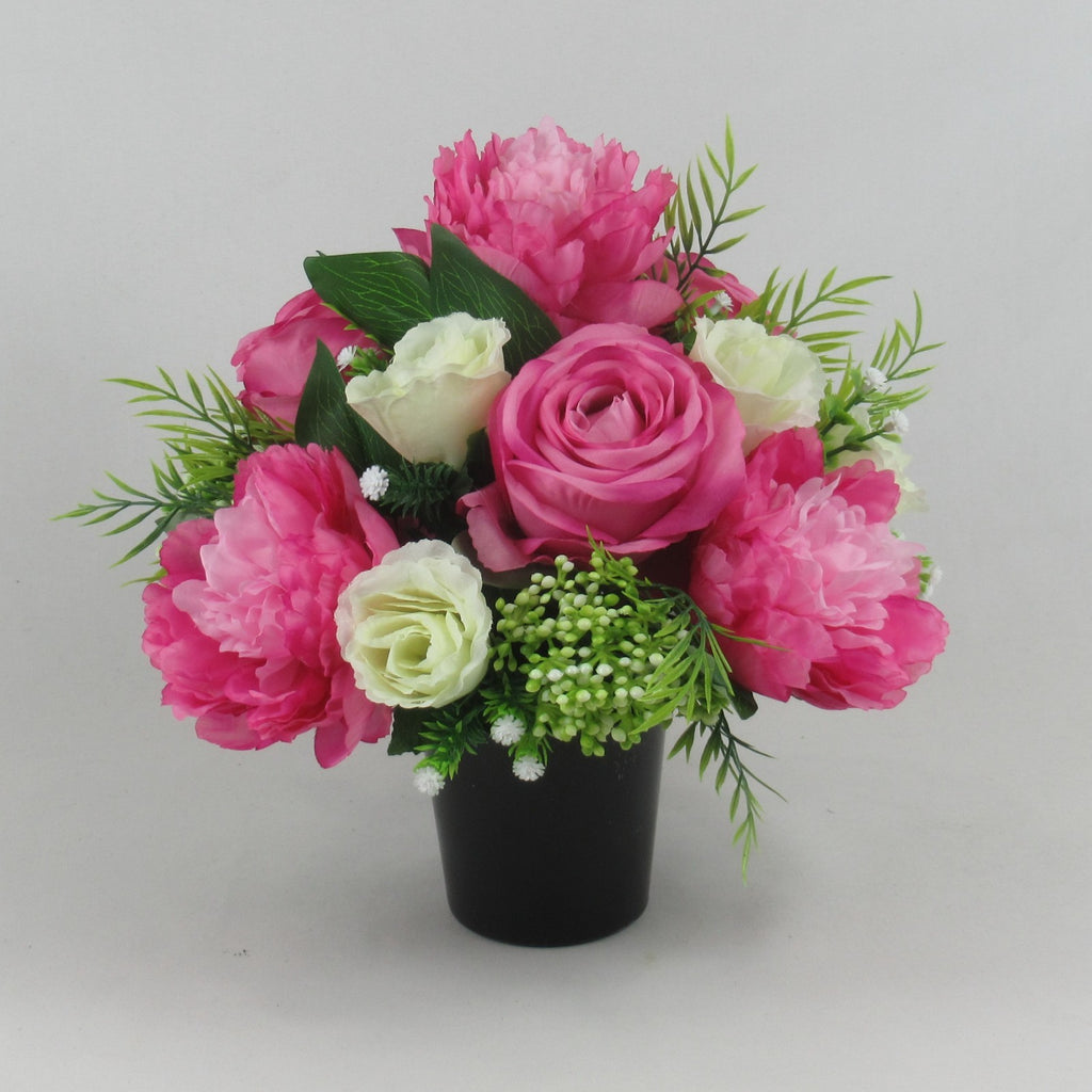 Pink and cream artificial rose and peony grave memorial bouquet, green buds, black vase