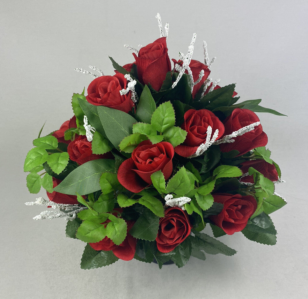 Large red rose artificial arrangement with green foliage and silver beaded twig details.