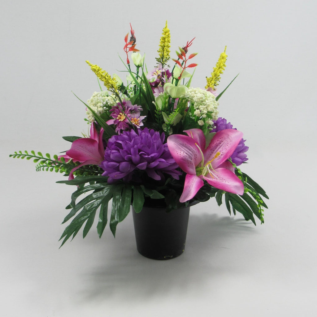 Modern style grave flower arrangement with purple chrysanthemums artificial