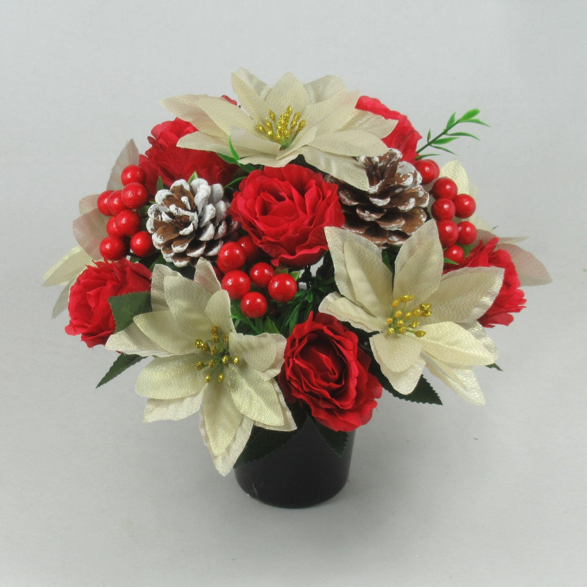 Christmas grave flower arrangement - gold poinsettias, roses, pinecones 26cm