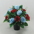 Artificial grave rose arrangement with red and light blue blooms in a black pot