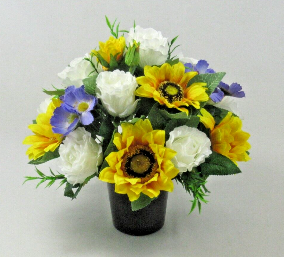 Artificial silk cemetery pot arrangement, front view: yellow sunflowers, white roses, blue flowers