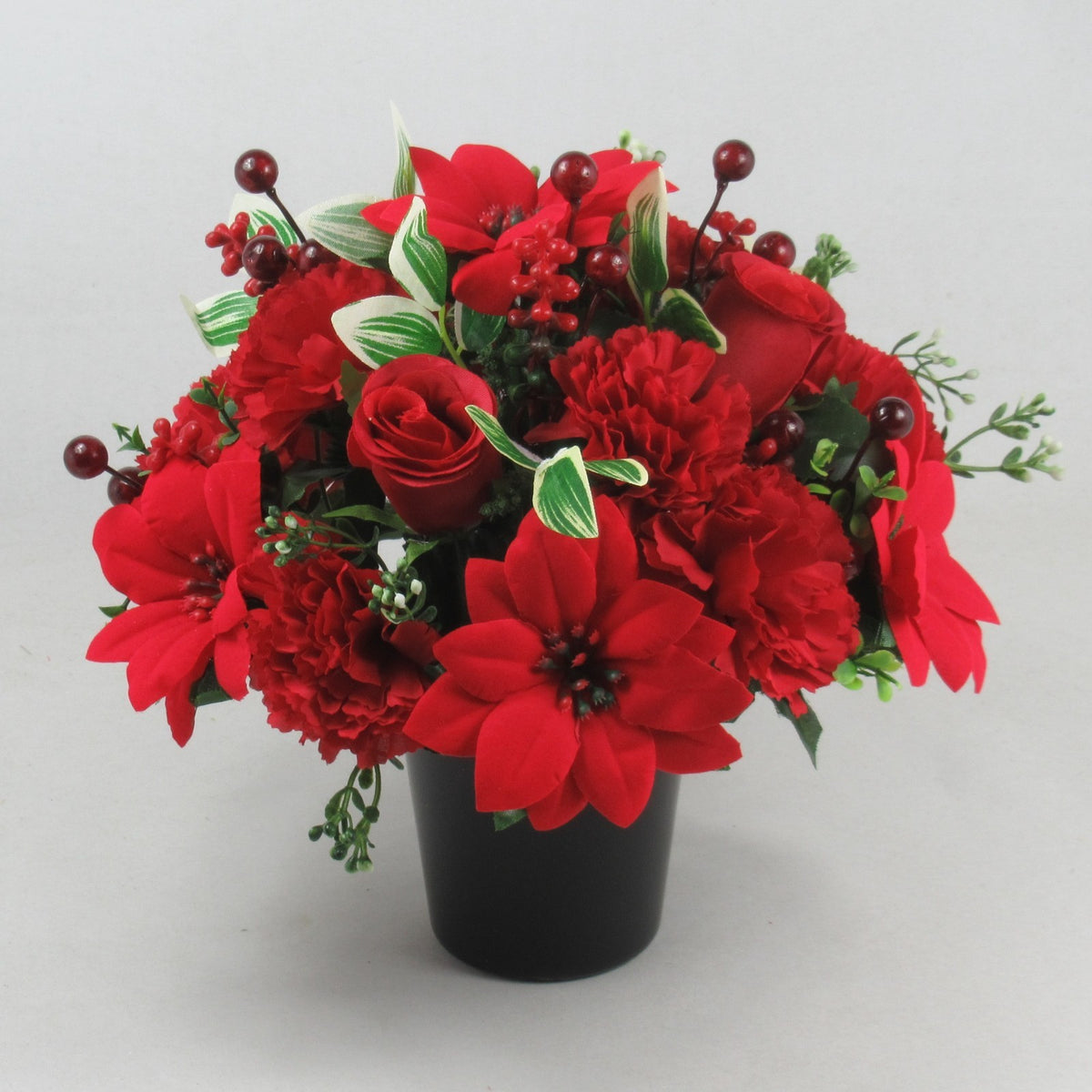 Christmas grave flower arrangement - red poinsettias, rose, carnations 24cm